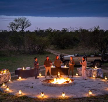 Guests enjoying a boma gathering at Arathusa Safari Lodge