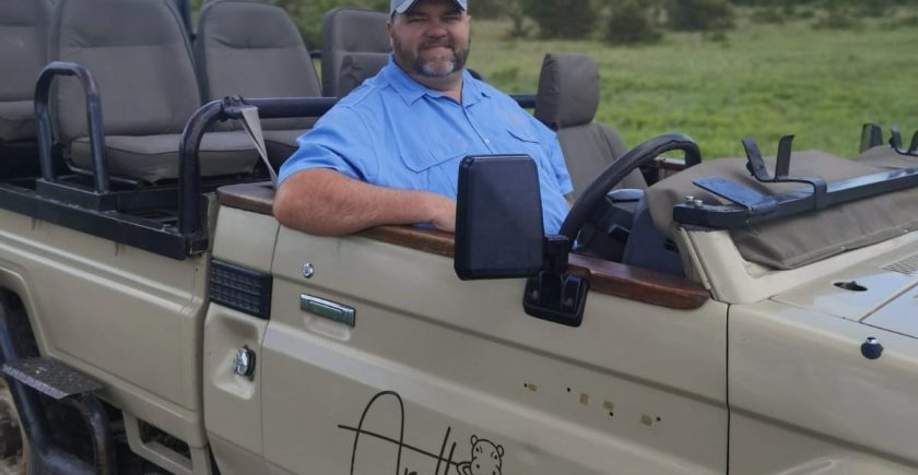 man-sitting-in-a-safari-vehicle